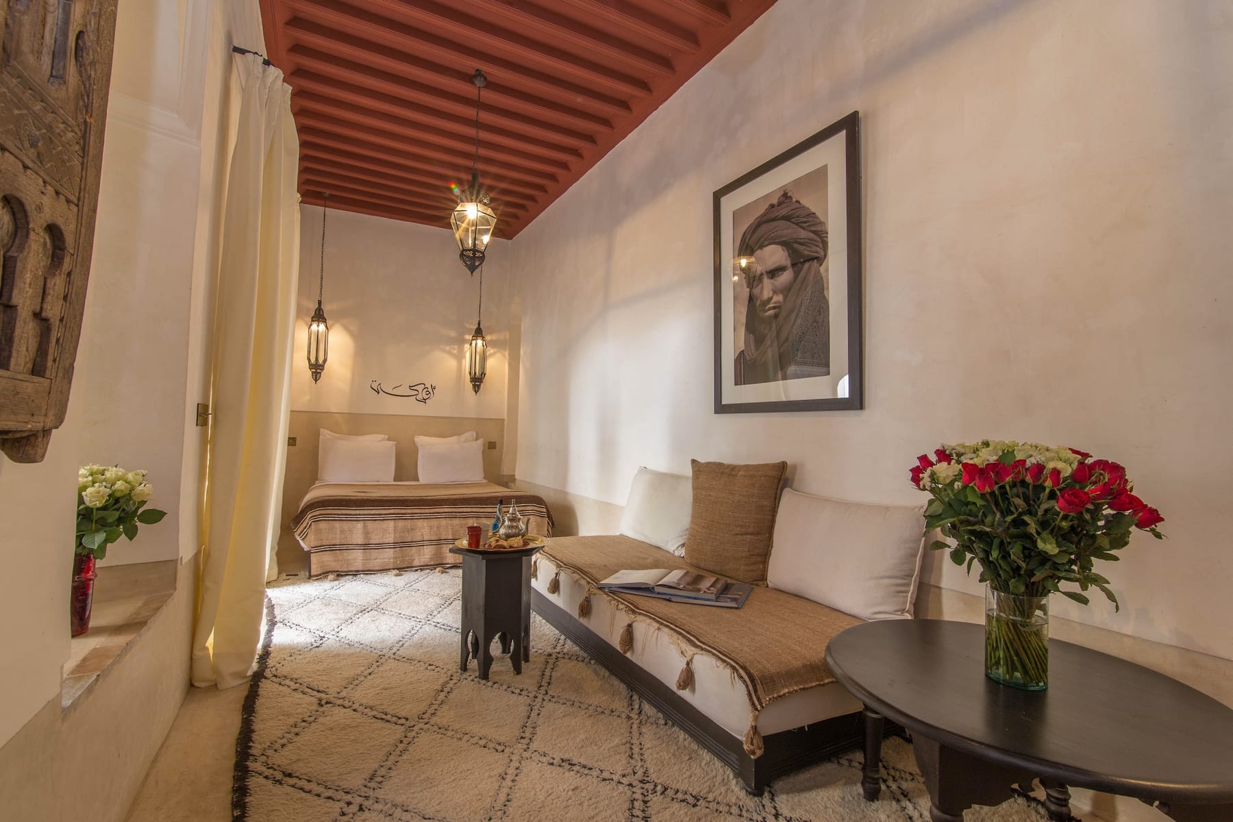 The long Ourika room with its bed and sitting corner